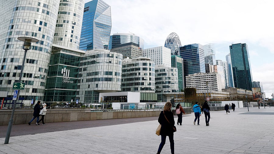 <div class="paragraphs"><p>People walk on the esplanade of La Defense in the financial and business district of La Defense, near Paris, France, January 27, 2025. </p></div>