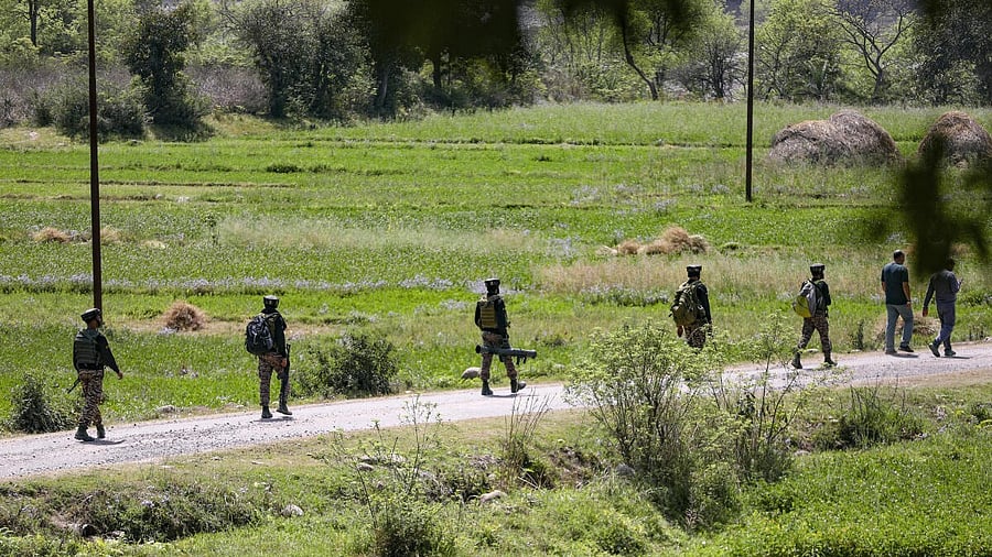 <div class="paragraphs"><p>Security personnel keep vigil during a search operation in Kathua.&nbsp;</p></div>