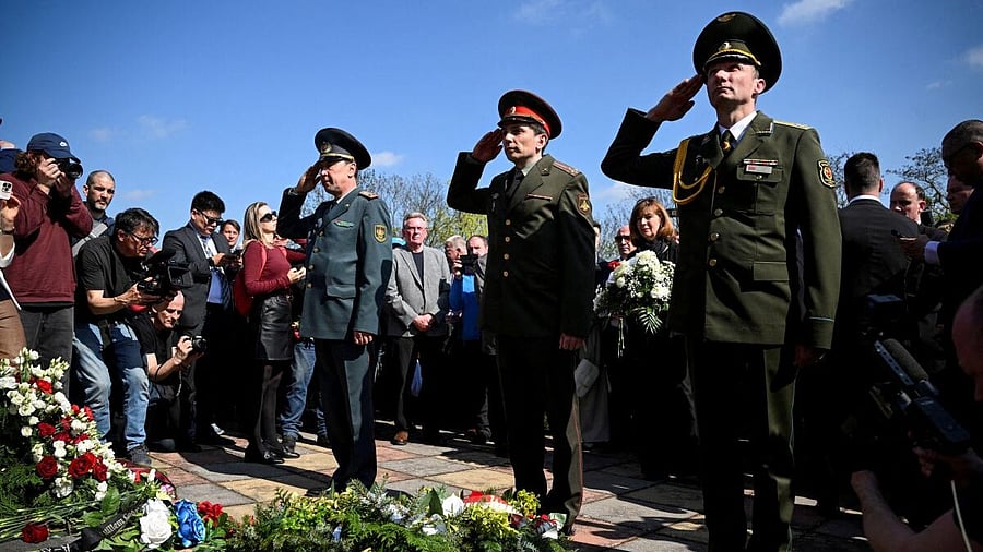 <div class="paragraphs"><p>Belarusian Colonel Ales Pashkevich salutes, with fellow Russian and Kazakh colonels, as they lay flowers, at a commemoration of the Battle of the Seelow Heights to mark the 80th anniversary of the end of World War Two, in Seelow, Germany.&nbsp;</p></div>