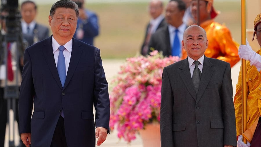 <div class="paragraphs"><p>Chinese President Xi Jinping stands with Cambodia's King Norodom Sihamoni during his two-day visit to Cambodia, in Phnom Penh, Cambodia April 17, 2025. </p></div>