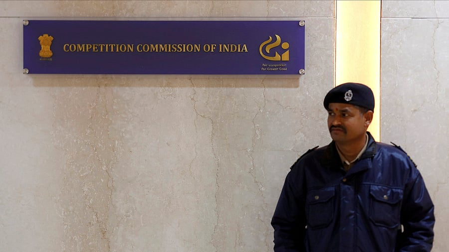 <div class="paragraphs"><p>FILE PHOTO: A security guard stands outside the Competition Commission of India  headquarters in New Delhi.</p></div>