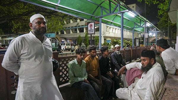 <div class="paragraphs"><p>Relatives of victims wait during recue operation after the collapse of a building in Mustafabad area in New Delhi, Saturday, April 19, 2025.</p></div>