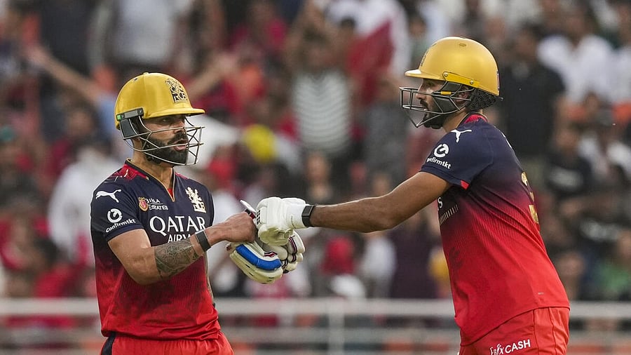 <div class="paragraphs"><p>Royal Challengers Bengaluru's Virat Kohli and Devdutt Padikkal during an Indian Premier League (IPL) 2025 T20 cricket match between Punjab Kings and Royal Challengers Bengaluru, at Maharaja Yadavindra Singh International Cricket Stadium, in New Chandigarh, Sunday, April 20, 2025.</p></div>
