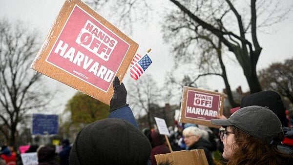 <div class="paragraphs"><p>Demonstrators rally on Cambridge Common in a protest organized by the City of Cambridge calling on Harvard leadership to resist federal government interference at the university in Cambridge, Massachusetts.</p></div>