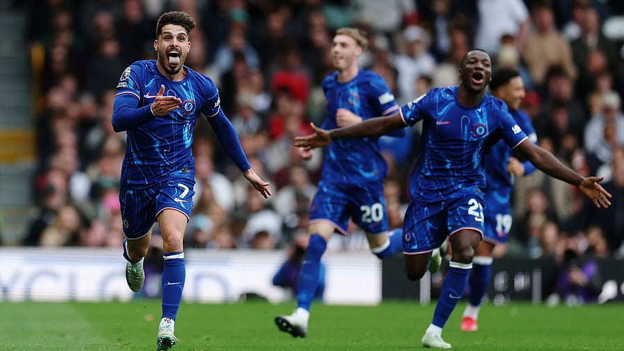 <div class="paragraphs"><p>Chelsea's Pedro Neto celebrates scoring their second goal with teammates.</p></div>