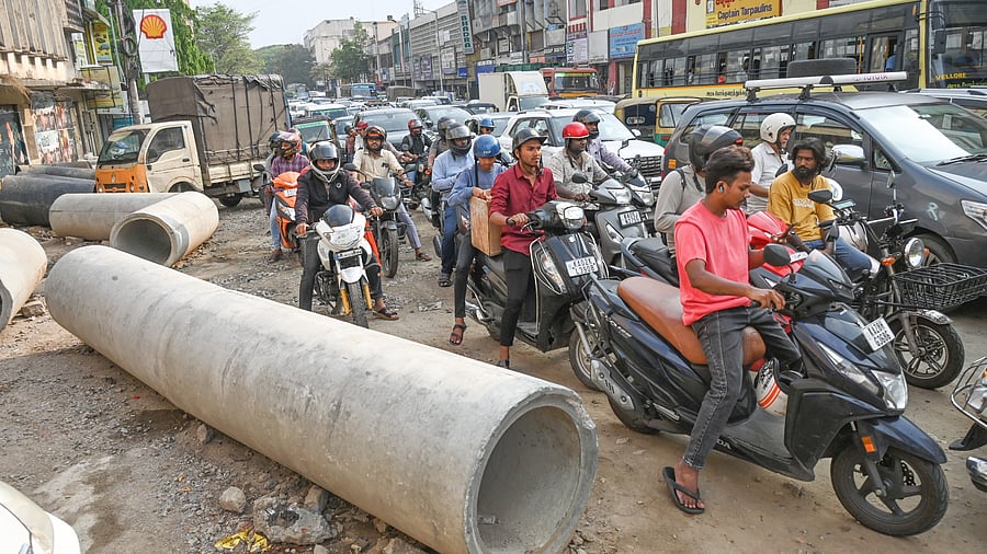 <div class="paragraphs"><p>Large pipes dumped carelessly, choke JC Road.</p></div>