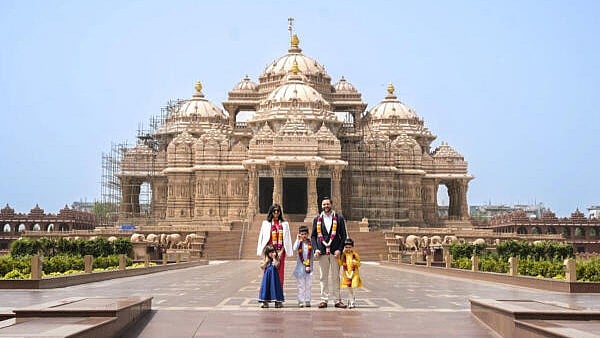 <div class="paragraphs"><p>J D Vance and family at the temple</p></div>