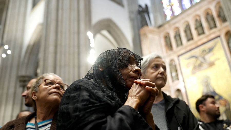 <div class="paragraphs"><p>People pay tribute to Pope Francis in the Cathedral of Se, after his death was announced by the Vatican, in Sao Paulo, Brazil, April 21, 2025. </p></div>