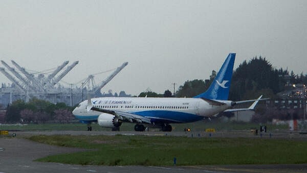 <div class="paragraphs"><p> A Boeing 737 MAX plane, intended for China's Xiamen Airlines, arrives at King County International Airport after returning from China due to ongoing tariff disputes, in Seattle, Washington, US April 19, 2025. </p></div>