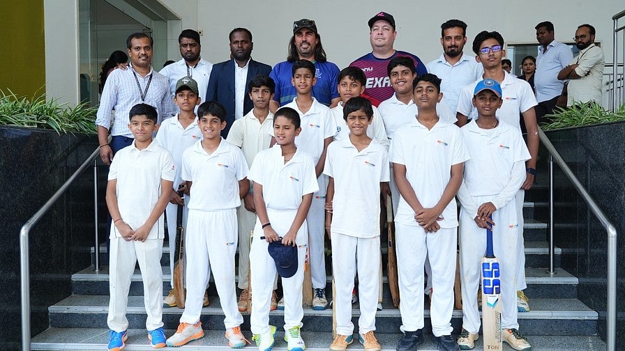 Former New Zealand cricketers Mathew Sinclair (fourth from left in back row) and Jesse Ryder at the International Cricket Camp organised by VIBGYOR High in Bengaluru on Monday.