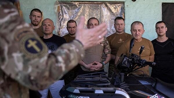 <div class="paragraphs"><p>Military chaplain conducts Easter service for Ukrainian service members of the "Khartia" 13th Operational Brigade, near a front line, amid Russia's attack on Ukraine, in Kharkiv region.</p></div>