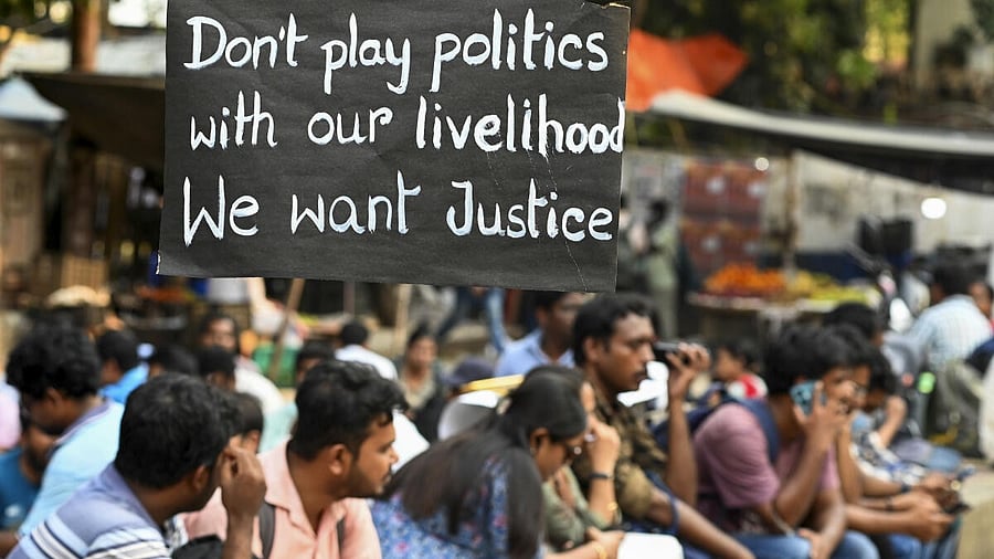 <div class="paragraphs"><p>Teachers and non-teaching staff, dismissed from government-aided schools, during their sit-in protest in Kolkata.</p></div>