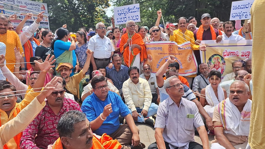 <div class="paragraphs"><p>Members of Brahmin community under the banner of Belagavi District Samast Brahmin Samaj staging sit-in protests in Belagavi on Monday against removal of ‘Janivara’ by the staff of two students appearing for CET at examination centres at Shivamogga and Bidar and hurting religious sentiments of the community.</p></div>