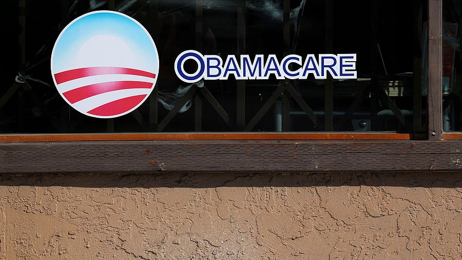 <div class="paragraphs"><p> A sign on an insurance store advertises Obamacare in San Ysidro, San Diego, California, US, October 26, 2017.</p></div>