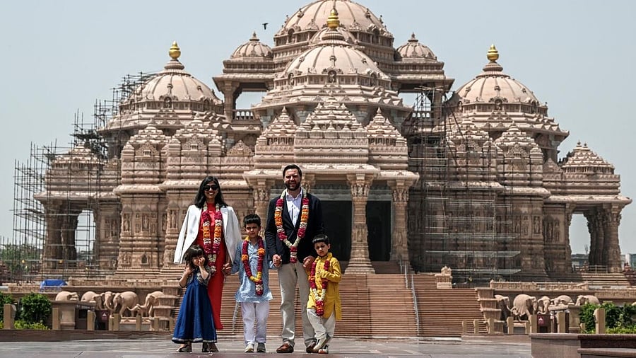 <div class="paragraphs"><p>US Vice President JD Vance, Second Lady Usha Vance and their children pose for a photo in front of the Akshardham Temple, in New Delhi, April 21, 2025.</p></div>