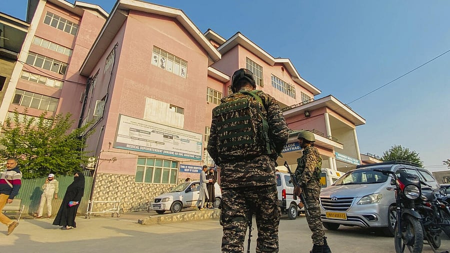 <div class="paragraphs"><p>Security personnel stand guard after terrorists attacked a group of tourists at Pahalgam</p></div>