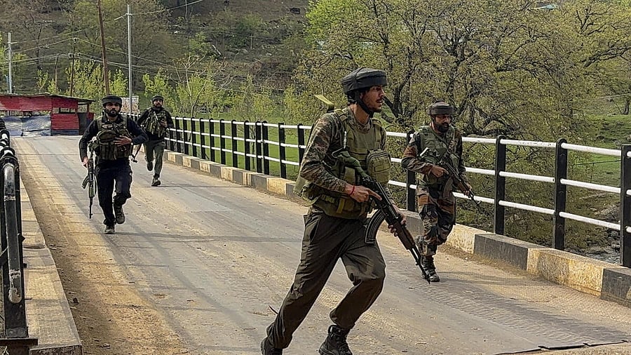 <div class="paragraphs"><p>Security personnel rush to the spot after terrorists attacked a group of tourists at Pahalgam, in Anantnag district, Jammu &amp; Kashmir, Tuesday, April 22, 2025. </p></div>
