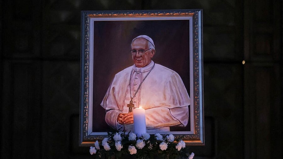 <div class="paragraphs"><p>A candle burns before an image of Pope Francis, in front of the Mother Teresa Cathedral in Pristina, Kosovo April 21, 2025.</p></div>