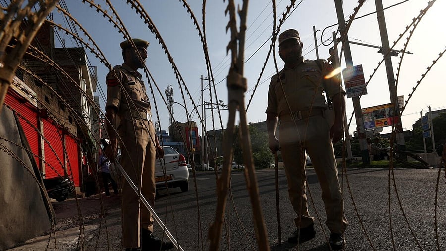 <div class="paragraphs"><p>Security personnel guard on a street a day after Pahalgam terrorist attack, in Jammu, Wednesday, April 23, 2025. </p></div>