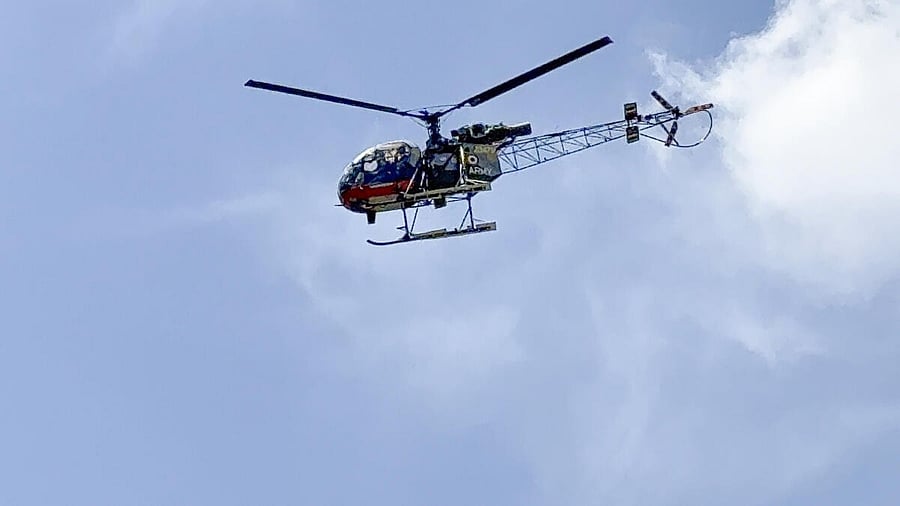 <div class="paragraphs"><p>An army helicopter carries Union Home Minister Amit Shah for a visit to the site of the Pahalgam terror attack in Anantnag district, Jammu and Kashmir, Wednesday, April 23, 2025.</p></div>
