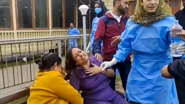 <div class="paragraphs"><p>People react after terrorists attacked a group of tourists at Pahalgam, in Anantnag district, Jammu & Kashmir.</p></div>