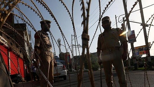<div class="paragraphs"><p>Security personnel guard on a street a day after Pahalgam terrorist attack, in Jammu, Wednesday.</p></div>