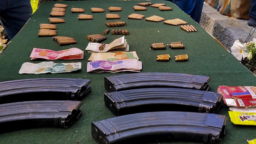 <div class="paragraphs"><p>Arms and ammunition, recovered by the Army, being displayed, a day after the terror attack in Pahalgam.</p></div>