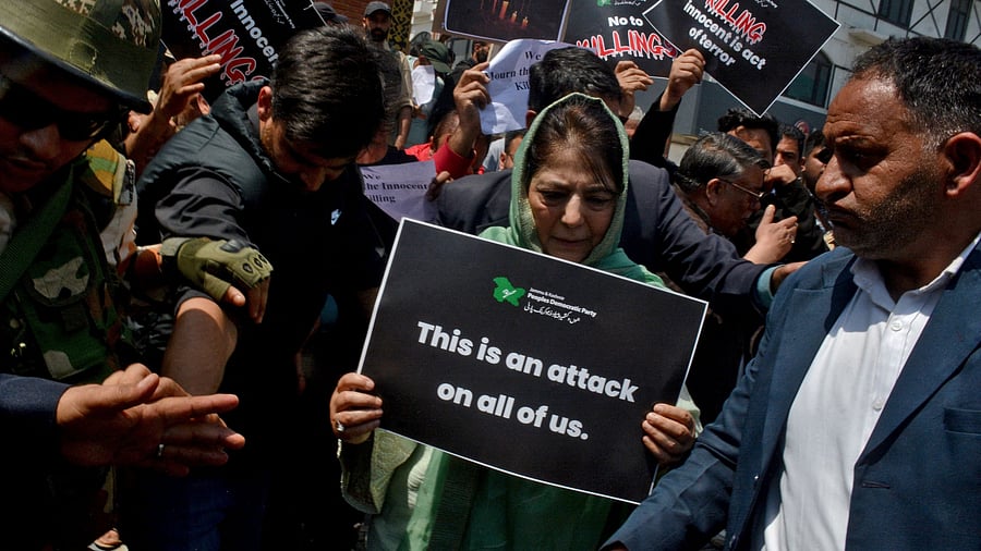 <div class="paragraphs"><p>Mehbooba Mufti, former chief minister of Jammu and Kashmir and leader of Peoples Democratic Party , holds a placard during a protest against the attack on tourists, following a militant attack near south Kashmir's scenic Pahalgam, in Srinagar, April 23, 2025. </p></div>