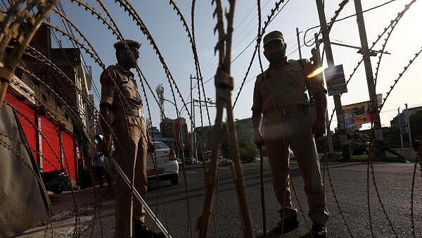 <div class="paragraphs"><p>Security personnel guard on a street a day after Pahalgam terrorist attack, in Jammu.</p></div>
