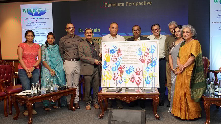 <div class="paragraphs"><p>Health Minister Dinesh Gundu Rao (C) along with dignitaries at the World Psycho-Oncology Day 2025 event in the city on Wednesday. </p></div>