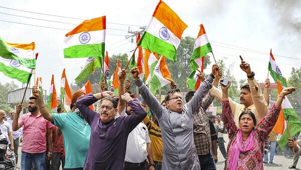 <div class="paragraphs"><p>People raise slogans during a protest against the Pahalgam terror attack during a ‘bandh’, in Jammu.</p></div>