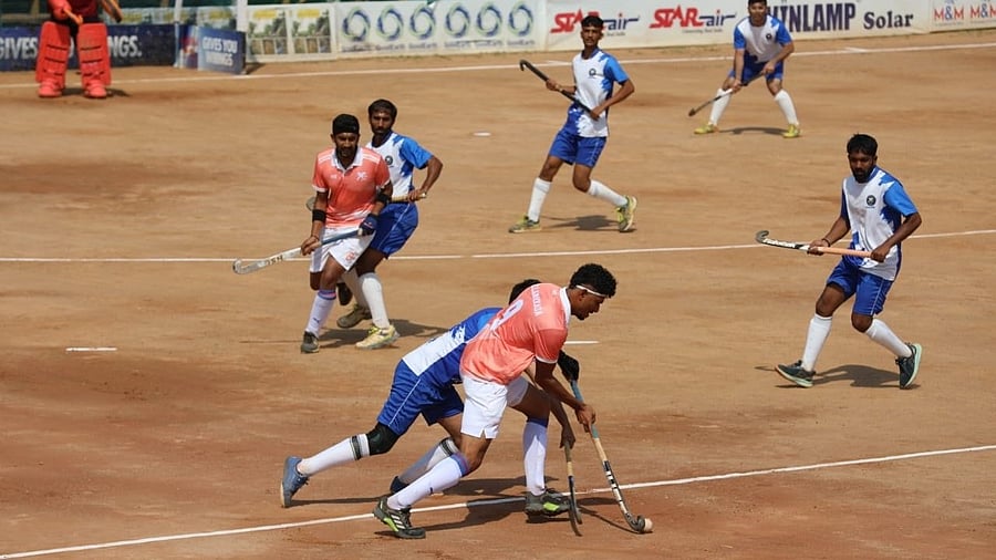 Two teams compete at one of the annual hockey festivals at Kodagu.