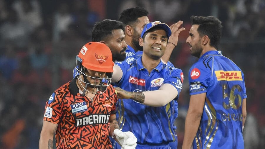 <div class="paragraphs"><p>Mumbai Indians' players celebrate the wicket of Sunrisers Hyderabad's Ishan Kishan as he walks off the field during the Indian Premier League (IPL) 2025 cricket match between Sunrisers Hyderabad and Mumbai Indians, in Hyderabad, Wednesday, April 23, 2025. </p></div>