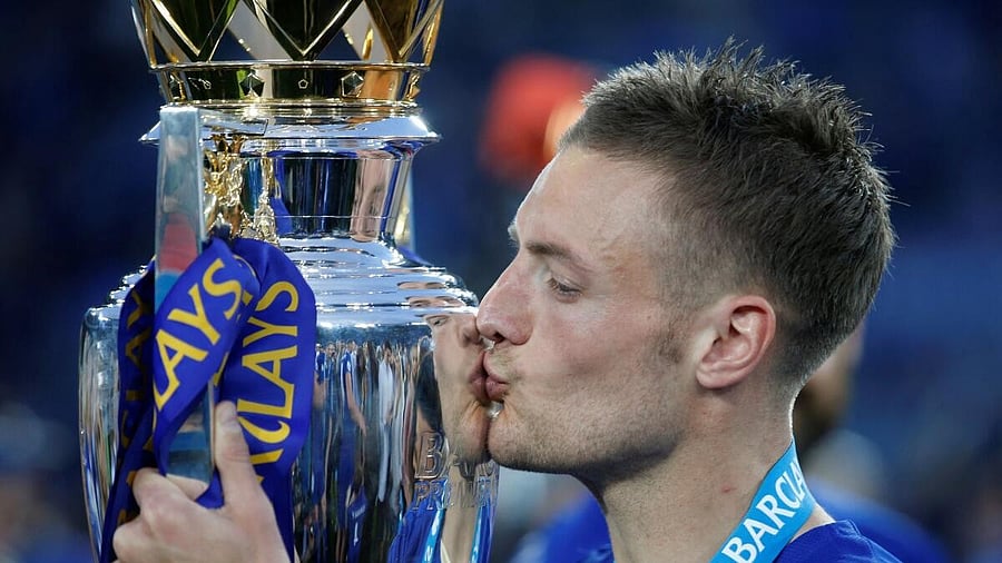 <div class="paragraphs"><p>Leicester City's Jamie Vardy lifts the trophy as he celebrates winning the Barclays Premier League.</p></div>