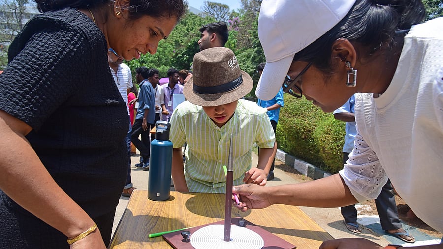 <div class="paragraphs"><p>Children explore Zero Shadow Day with hands-on experiments at the Indian Institute of Astrophysics (IIA), Bengaluru, on Thursday. </p></div>