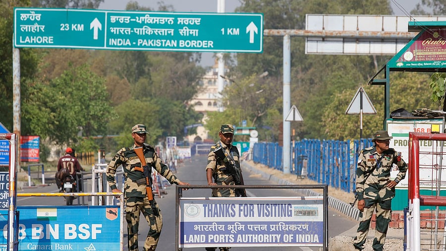 <div class="paragraphs"><p>Border Security Force security personnel stand guard at the Attari-Wagah crossing on the India-Pakistan border in Amritsar, following Tuesday’s attack on tourists near south Kashmir’s Pahalgam.</p></div>