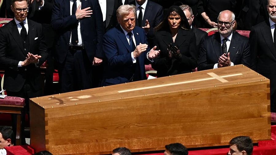 <div class="paragraphs"><p>US President Donald Trump and first lady Melania Trump, Spain's King Felipe and Queen Letizia watch as the coffin of Pope Francis is carried by pallbearers during his funeral Mass in St. Peter's Square at the Vatican, April 26, 2025.</p></div>