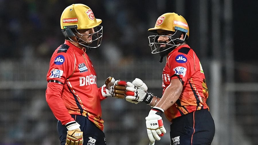 <div class="paragraphs"><p>Punjab Kings' Priyansh Arya bumps fists with Prabhsimran Singh after hitting six runs.</p></div>