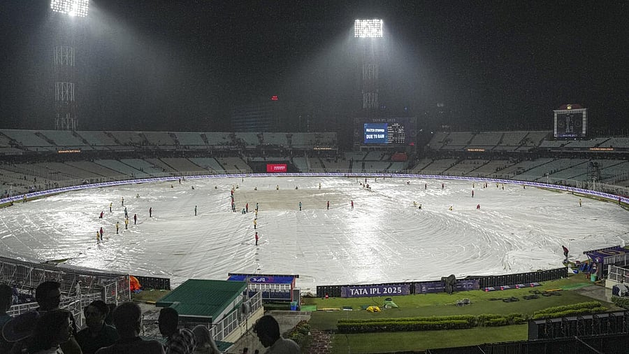 <div class="paragraphs"><p>Ground staff covers the field after rain stopped play during an Indian Premier League (IPL) 2025 T20 cricket match between Kolkata Knight Riders and Punjab Kings, at the Eden Gardens stadium, in Kolkata, West Bengal, Saturday, April 26, 2025.</p></div>