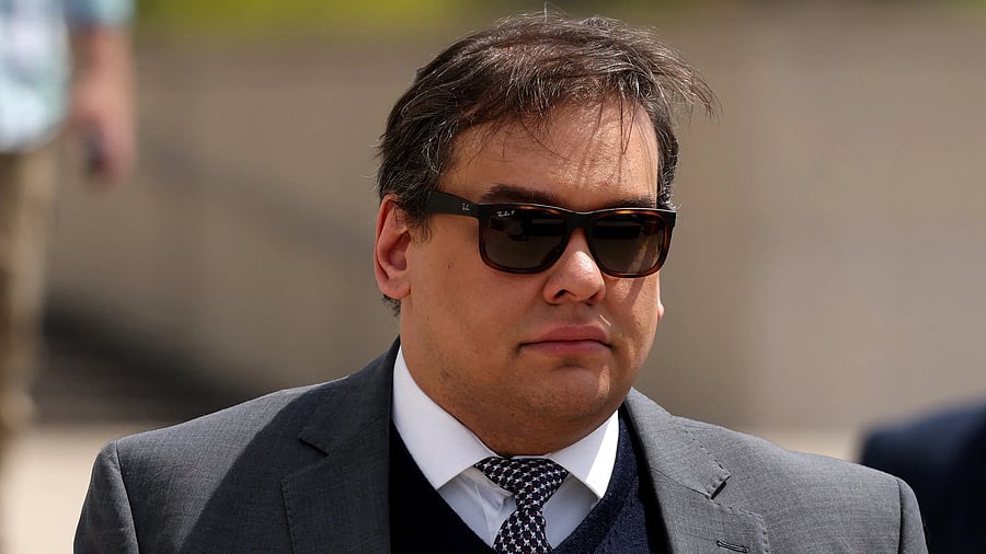 <div class="paragraphs"><p>George Santos, who was expelled from the U.S. House of Representatives, departs after the sentencing in his criminal corruption charges at Central Islip Federal Courthouse in Central Islip, New York.</p></div>