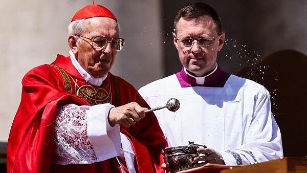 <div class="paragraphs"><p>Cardinal Giovanni Battista Re blesses the coffin of Pope Francis, during his funeral Mass, in St. Peter's Square at the Vatican.</p></div>