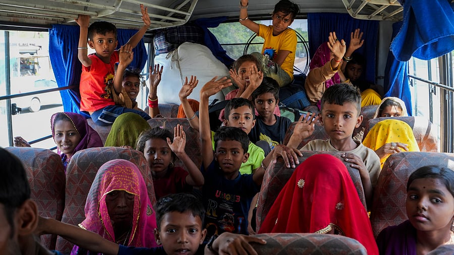 <div class="paragraphs"><p>Pakistani nationals arrive to cross over to their country as the deadline to exit India nears its end, amid escalating tensions between the two countries over the Pahalgam terror attack, at the Attari-Wagah border point, near Amritsar, Sunday, April 27, 2025.</p></div>