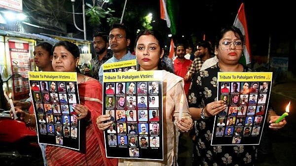 <div class="paragraphs"><p>Women participate in a candlelight vigil to protest against the Pahalgam terror attack, in Kolkata.</p></div>
