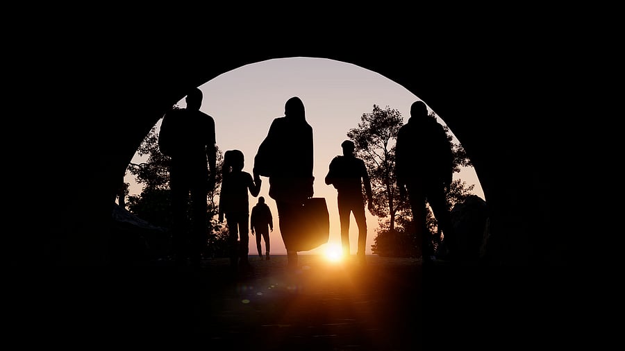 <div class="paragraphs"><p>Images showing silhouettes of people travelling with their belogings. For representational purposes.</p></div>