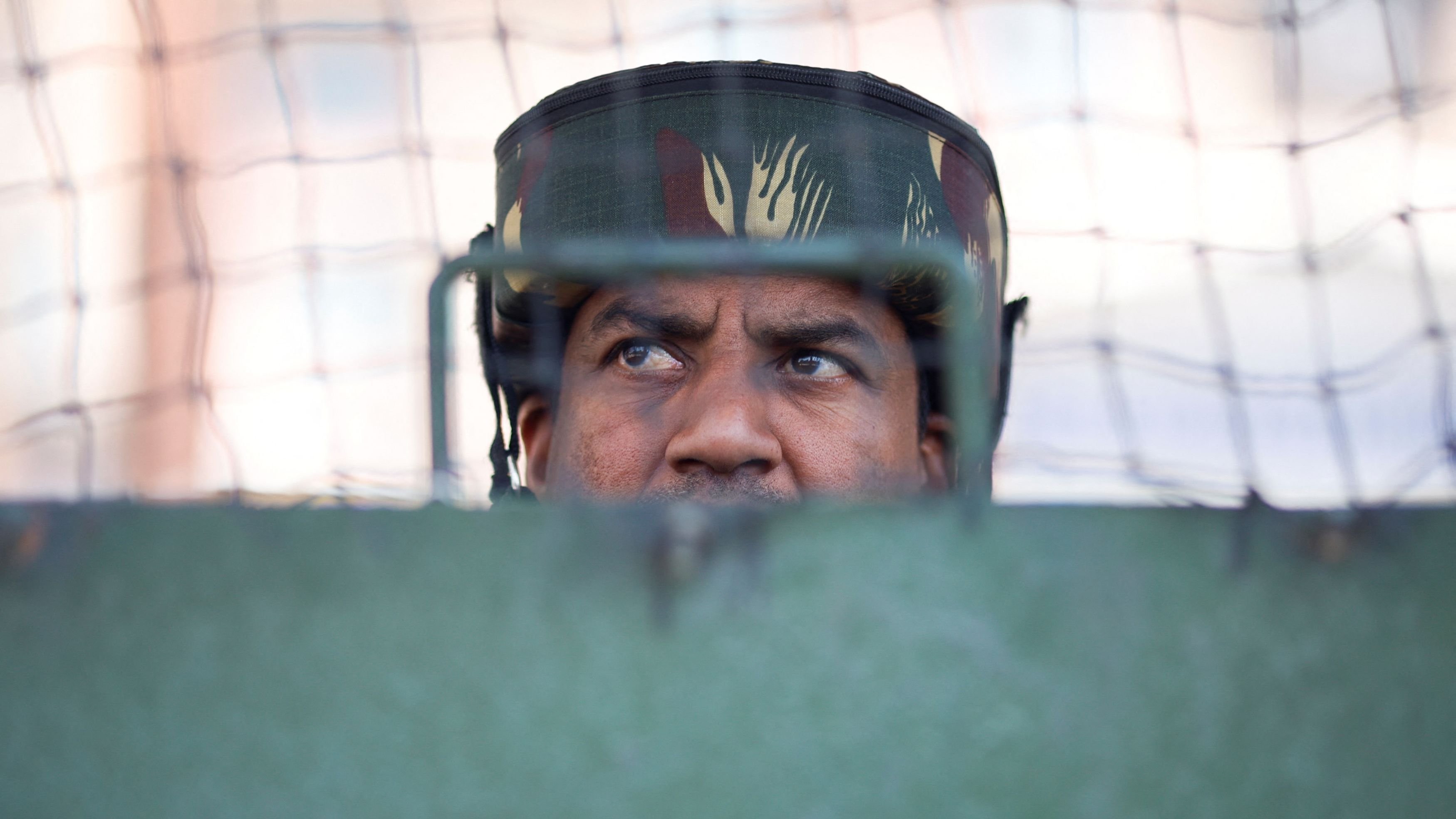 <div class="paragraphs"><p>An Indian security force personnel stands guard on a street, following a suspected militant attack near south Kashmir's Pahalgam, in Srinagar.</p></div>