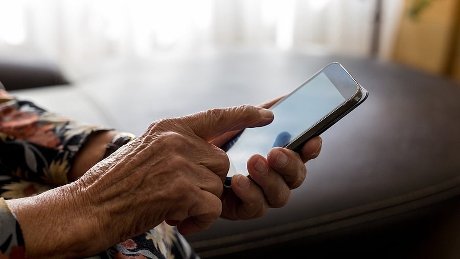 <div class="paragraphs"><p>Representative image showing a person attempting to use a smartphone&nbsp;</p></div>