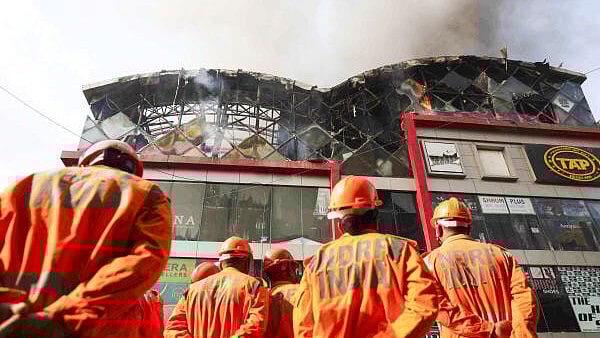 <div class="paragraphs"><p>NDRF personnel during a rescue operation after a fire broke out at the Link Square Mall, in the suburban Bandra area of Mumbai, on Tuesday.</p></div>