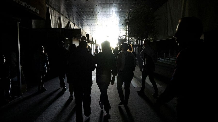 <div class="paragraphs"><p>People walk in Park Manzanares as Madrid Open matches were suspended due to a power outage, in Madrid, Spain, April 28, 2025.</p></div>