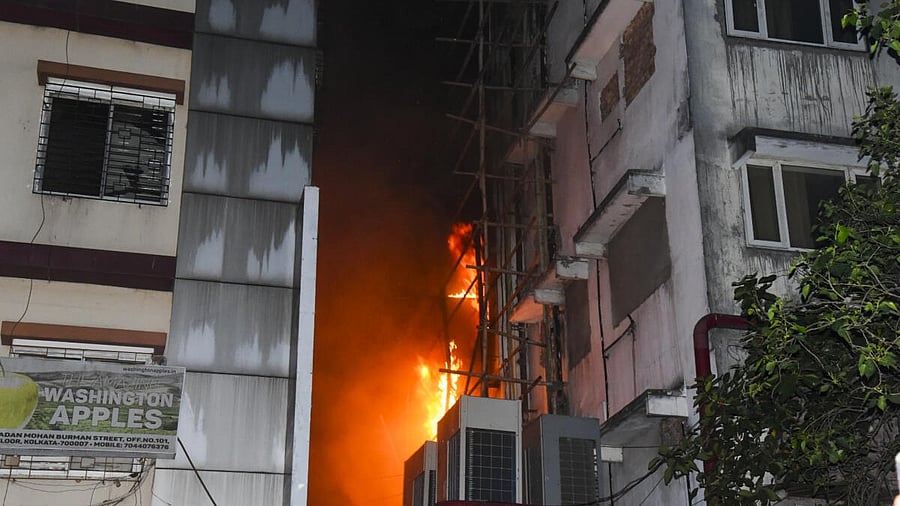 <div class="paragraphs"><p>Flames rise from the fire that broke out at a hotel in Kolkata.</p></div>