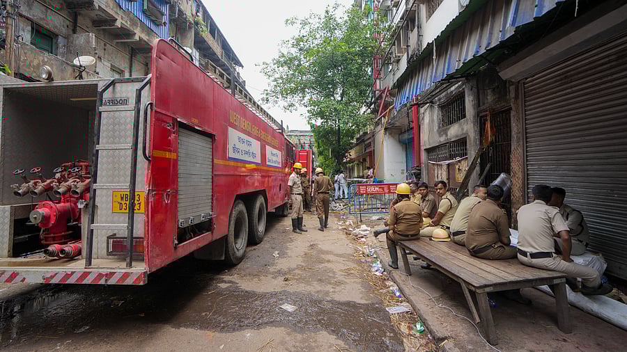 <div class="paragraphs"><p>Police personnel outside the Rituraj hotel a day after a fire broke out here, at Mechua in Kolkata, Wednesday, April 30, 2025. At least 14 people were killed and and several others injured.</p></div>